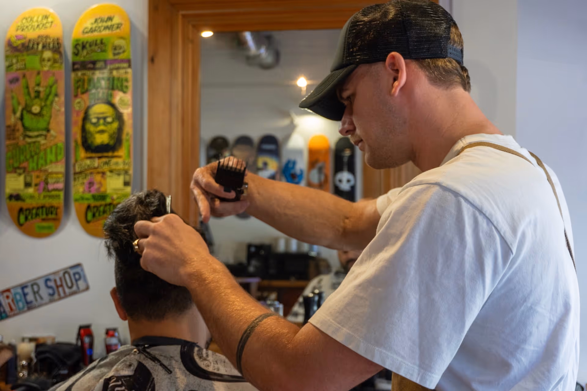 a man cutting a man's hair