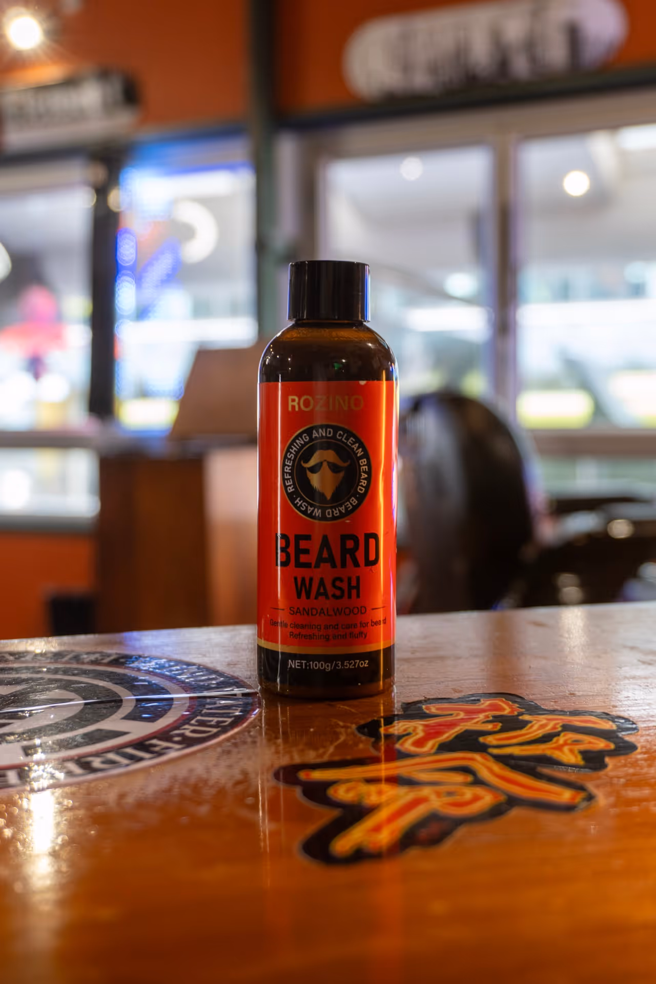 a bottle of beard wash on a table
